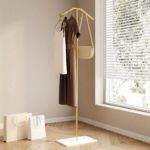 Space-Saving Metal Clothes Rack for Stylish Bedroom Use - صورة 12