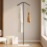 Space-Saving Metal Clothes Rack for Stylish Bedroom Use - صورة 6