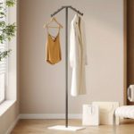 Space-Saving Metal Clothes Rack for Stylish Bedroom Use - صورة 10